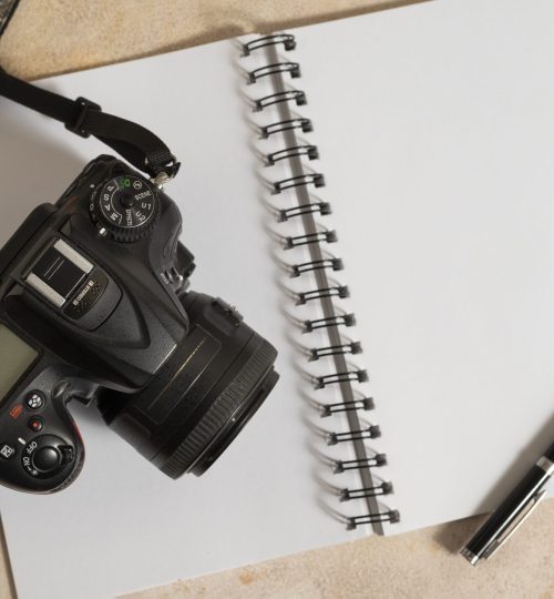top-view-photo-camera-indoors-still-life